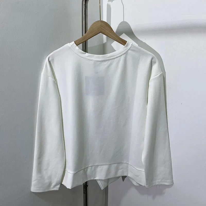 Pre Order: Round Neck Long Sleeved Irregular Hem Patchwork Top